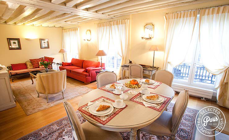 Living and dining room at Marais Elegance, apartment for rent in Paris, Marais