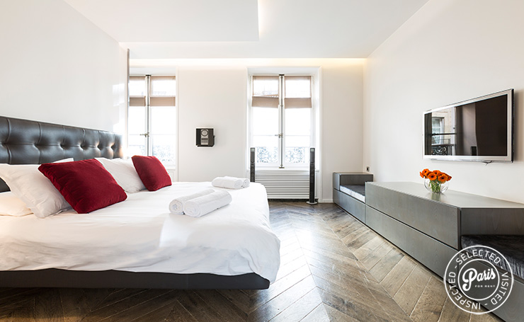 Bedroom with flat screen TV  at Elysee Garden, apartment rental in Paris, Champs-Elysées 