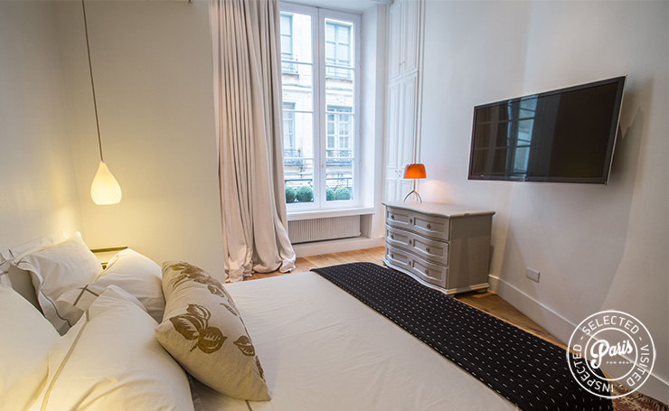 Flat screen TV in bedroom at St Germain Charm, apartment rental in Paris, Saint Germain