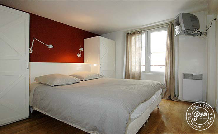 Bedroom at Place Bourg, apartment for rent in Paris, Marais
