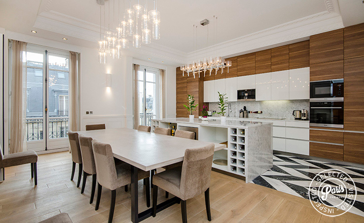 Dining room for 9 in luxury apartment is the ultimate Paris high-end vacation or business rentals