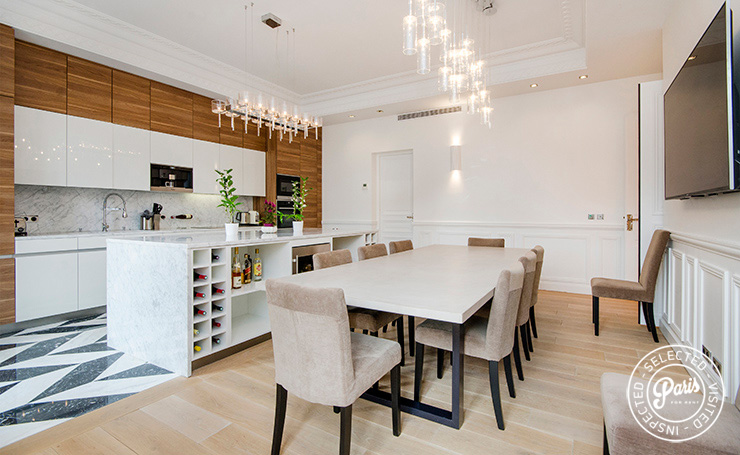 Dining room for 9 in luxury apartment is the ultimate Paris high-end vacation or business rentals